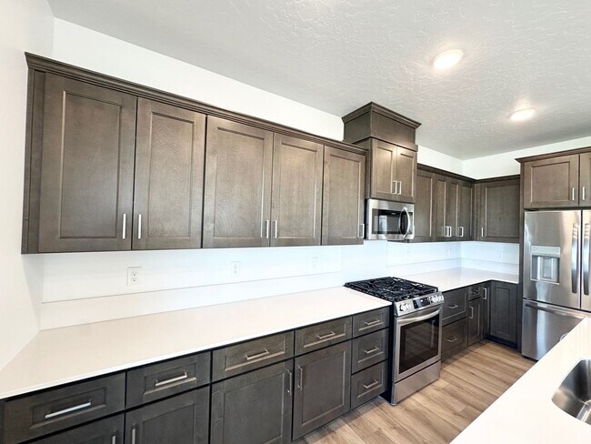Building Photo - Spacious Luxury Townhome Designed for Modern Living available soon!