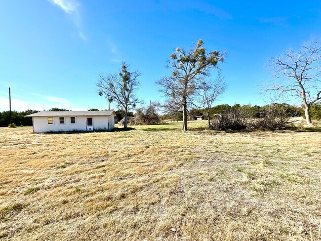Building Photo - **APPLICATION RECEIVED**  Charming Home on 2 Acres Outside Burnet – Wood Floors, Bonus Room & Ani...