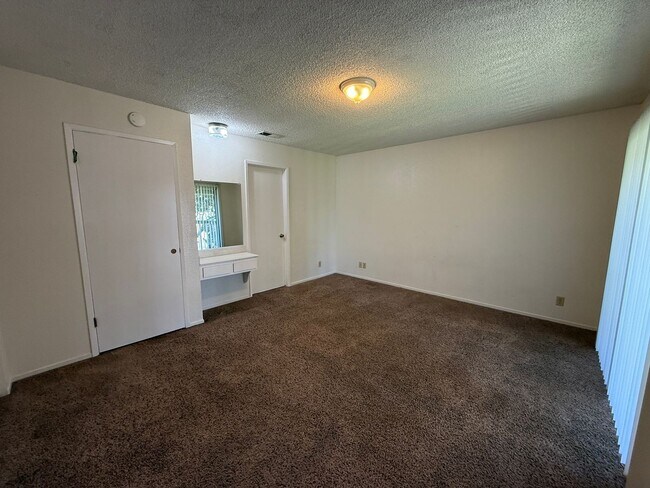 Building Photo - Large Two Story Condo with Two Car Detache...