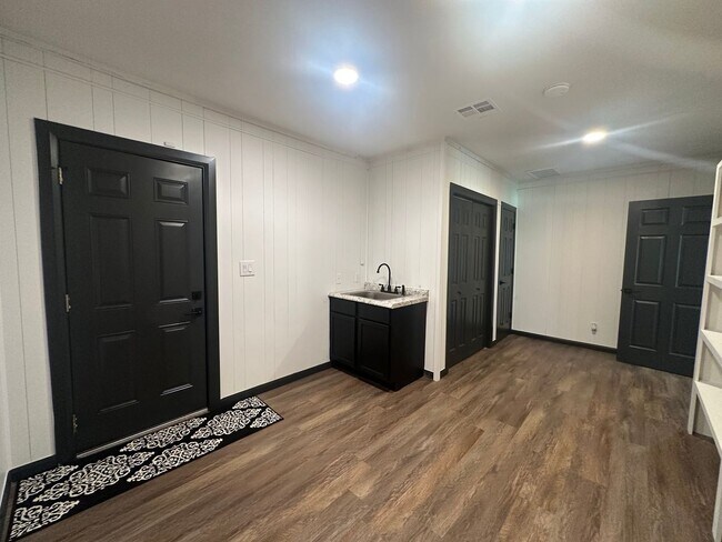 Building Photo - Welcome to country living with a fresh, modern twist.