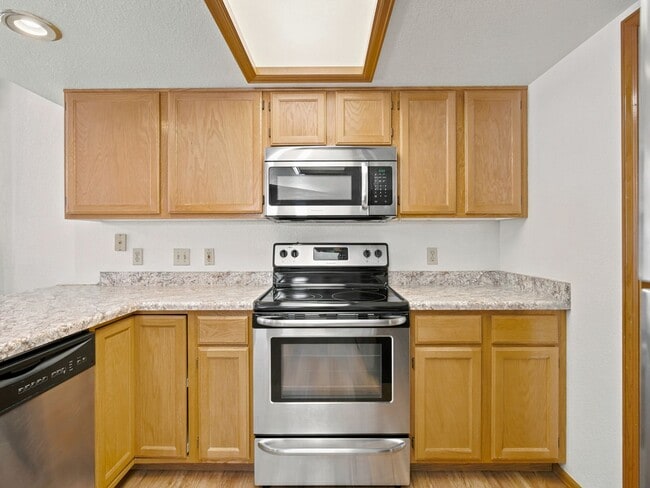 Building Photo - Spacious 2BR Rental with Open Floor Plan & Low-Maintenance yard