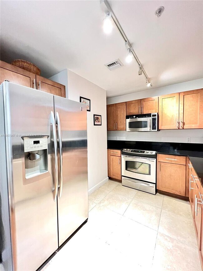 Building Photo - 8390 SW 72nd Ave