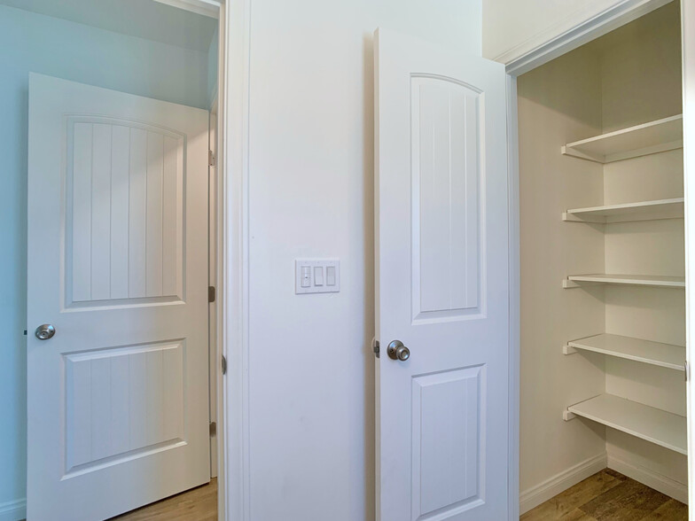 master bathroom linen closet - 1051 Greenfield Dr