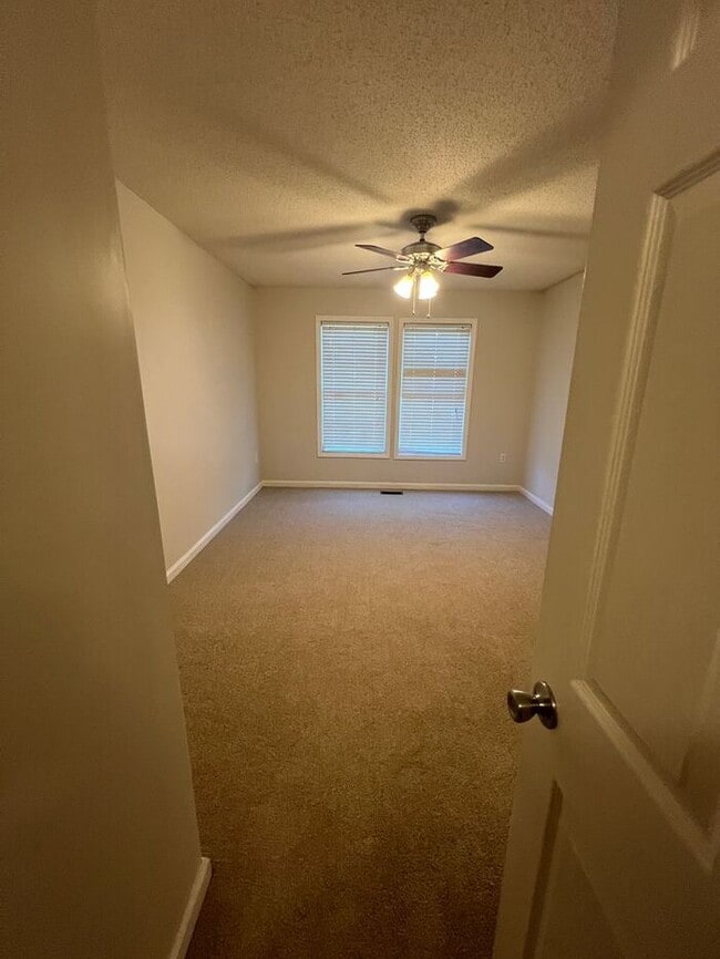 Building Photo - Ready now! Enjoy a private serene setting in the heart of the city!