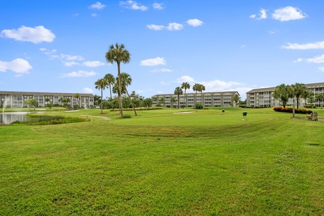 Building Photo - first-floor unit featuring a 2 bedroom, 2 ...