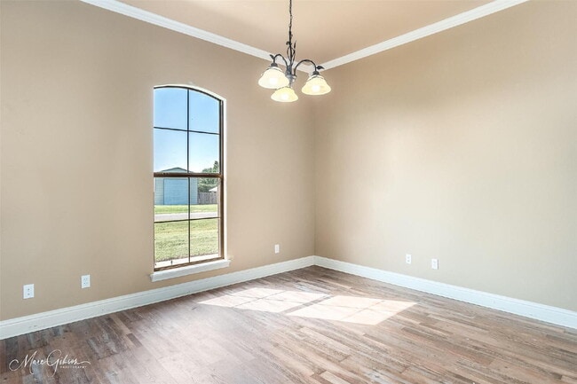 Building Photo - "Charming 4-Bedroom Gem with Spacious 2091...