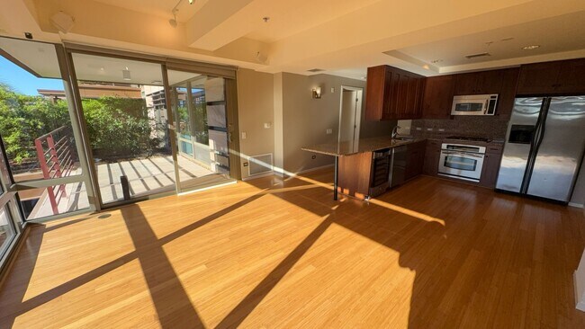 Building Photo - Experience Luxury Living at Optima Camelba...