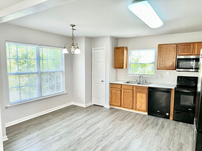 Building Photo - Updated 4BD, 2.5BA Raleigh Home With a 2-C...