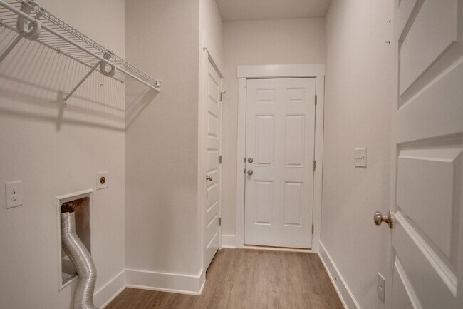 Building Photo - Spacious Cantonment Townhome with Open Layout, 2-Car Garage, Covered Back Porch & Easy Access to ...