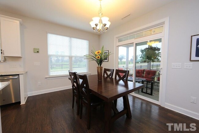 Building Photo - Main Floor Owner's Suite PLUS Main Floor G...