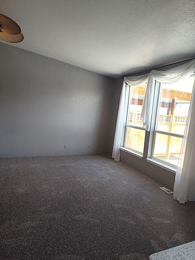 Building Photo - Spacious 3 Bed, 2 Bath Home with Shop & Stunning River Views – Clemans Addition