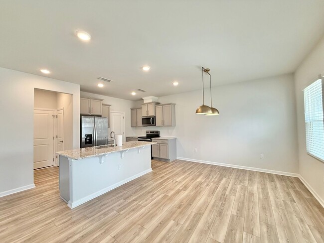 Building Photo - Stunning 3BD, 2.5BA Wendell Townhome with a 2-Car Garage in a Gorgeous HOA Community with Premium...
