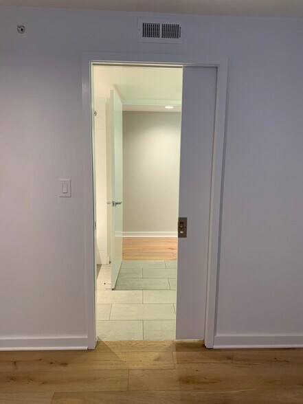 Second bedroom into bathroom - 129 W St NW