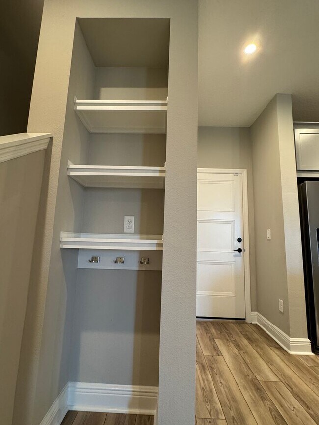 Building Photo - Elegant living in a vibrant, strategically located community—your perfect place to call home.