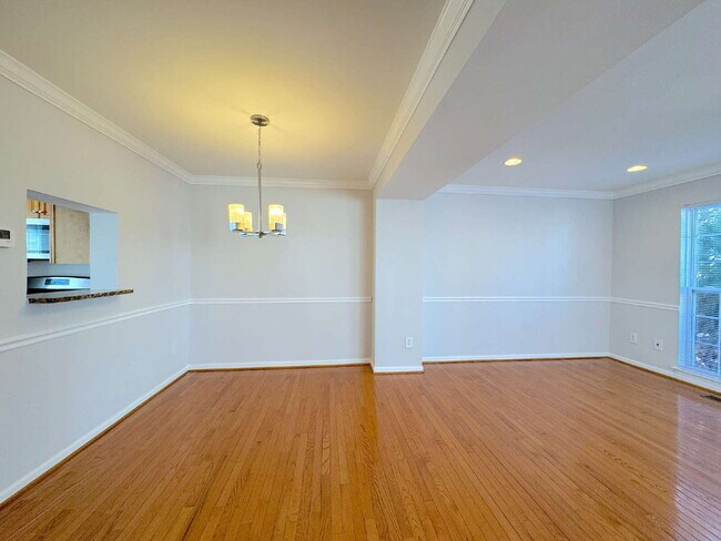 Building Photo - Inviting Suburban Retreat with Spacious Layout and Timeless Hardwood Flooring