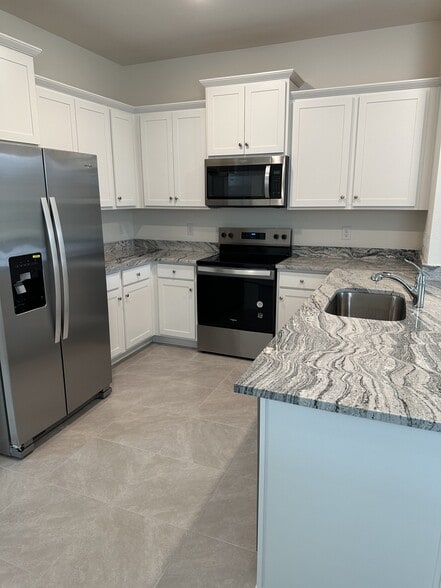 Building Photo - 4078 NW 44th Cir