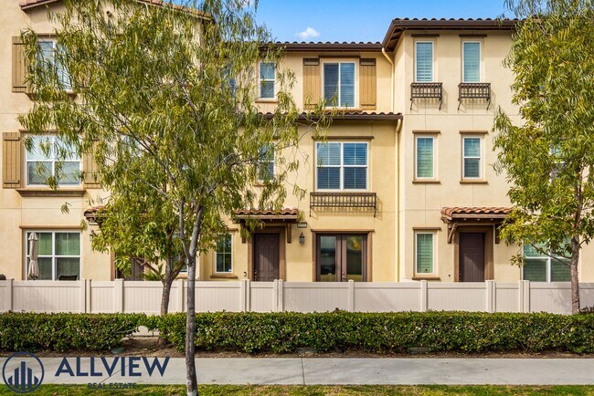 Building Photo - Modern Tri-Level Townhome with Office, 2-Car Garage & Prime Anaheim Location!