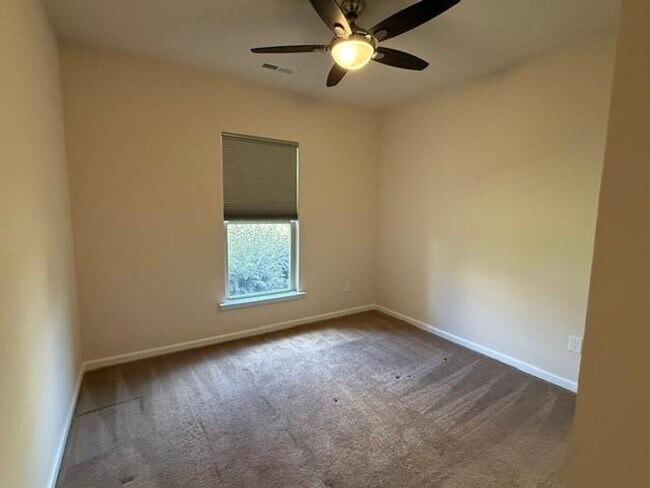 Building Photo - 1009 Magnolia Blossom Ln