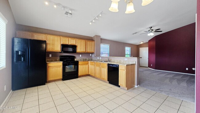 Building Photo - 23827 W Yavapai St
