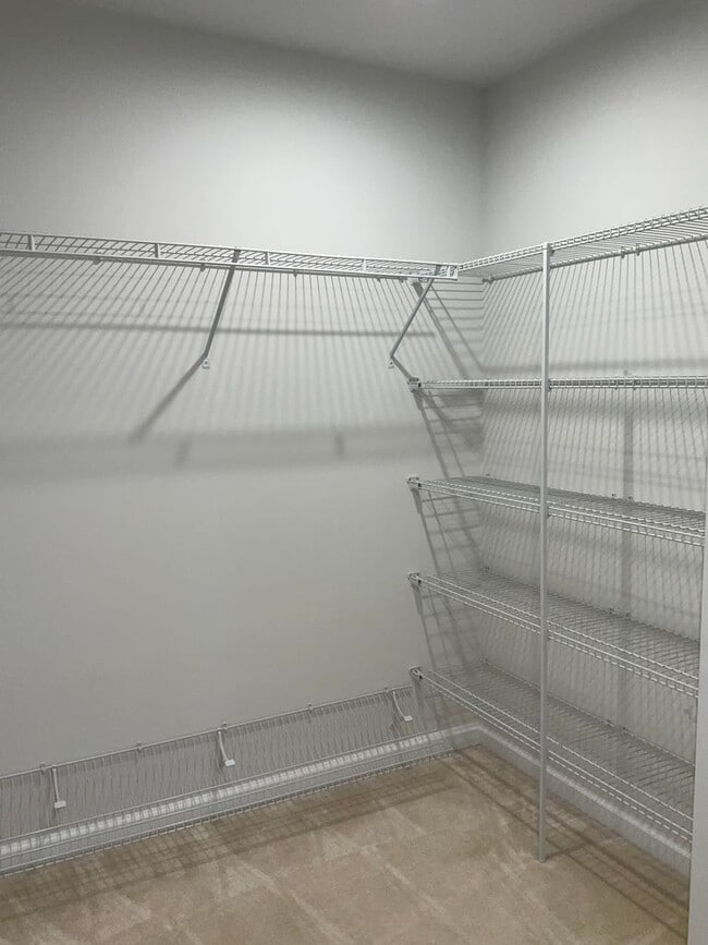 Building Photo - Beautiful 4BR 3.5BA 3 level townhome with 2 car attached garage located in the Cabin Branch Commu...