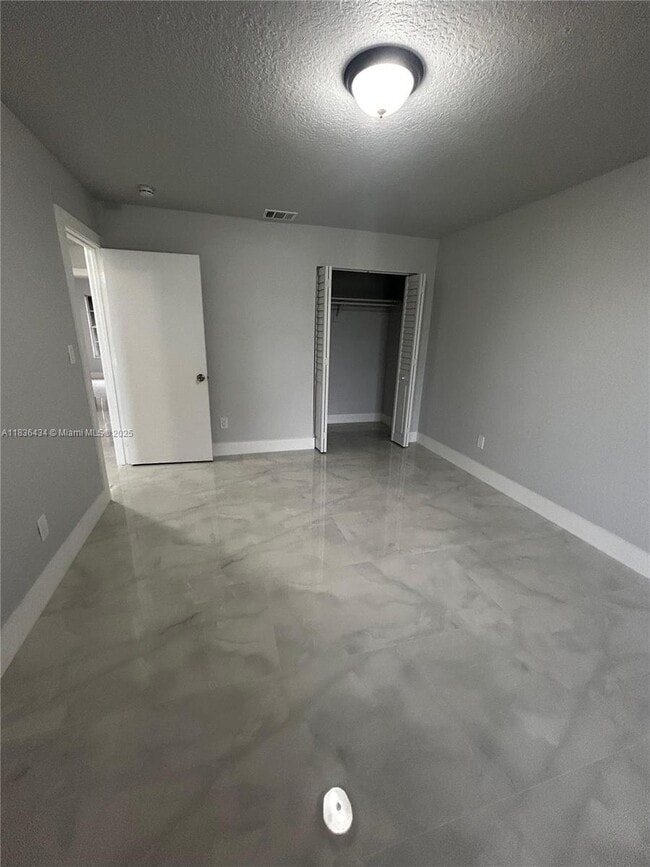 Building Photo - 6091 NW 29th Ave