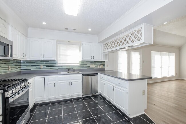 Building Photo - 6650 Spencer Forest Cove E