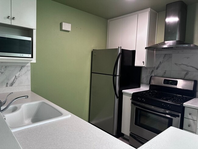 Building Photo - 10233 De Soto Ave