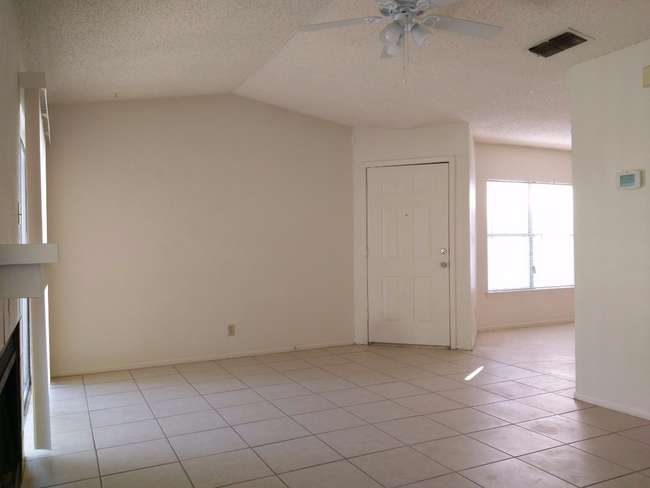 Living Room with Side Entrance into Dining Room - 2527 Corian Glen Dr