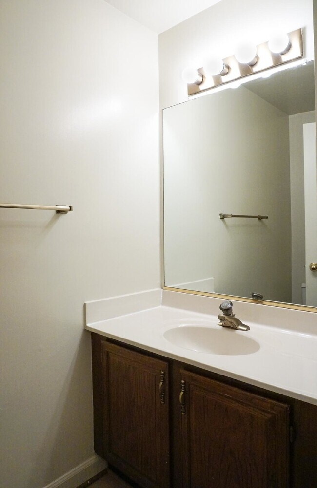 Building Photo - Beautiful brick townhome featuring three f...