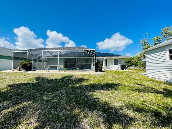 Building Photo - SOUTH GULF COVE-WATERFRONT POOL HOME!