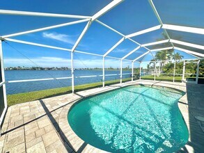 Building Photo - Beautiful Waterfront 3 Bed 2 Bath Home With Heated Pool, Washer/Dryer In Unit & More!