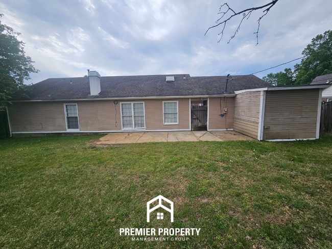 Building Photo - Quiet Cove Living in 38115 | 3BR/2BA with Brick Fireplace & Fenced Yard