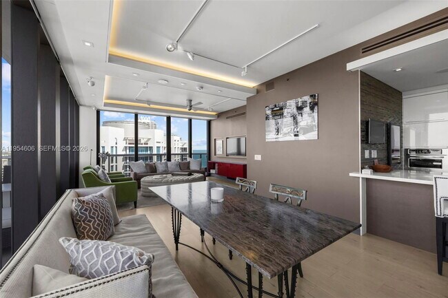 Building Photo - 5875 Collins Ave