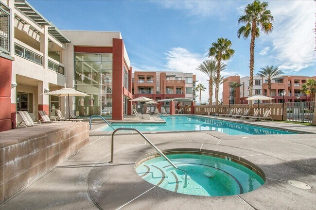 Building Photo - Top level 2 bedroom condo located in guard...