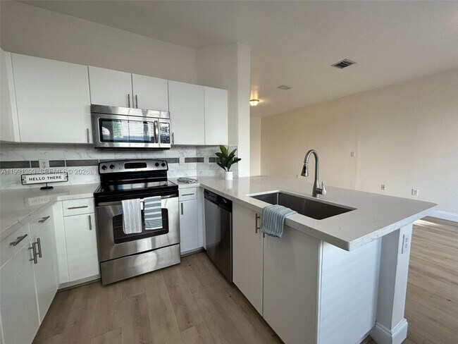 Building Photo - 12515 SW 124th Path