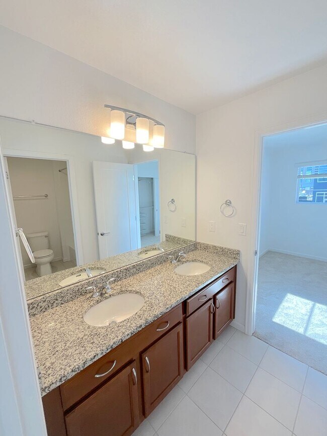 Building Photo - 3 Bedroom Townhome Available Near Voyager Pkwy & Interquest Pkwy!