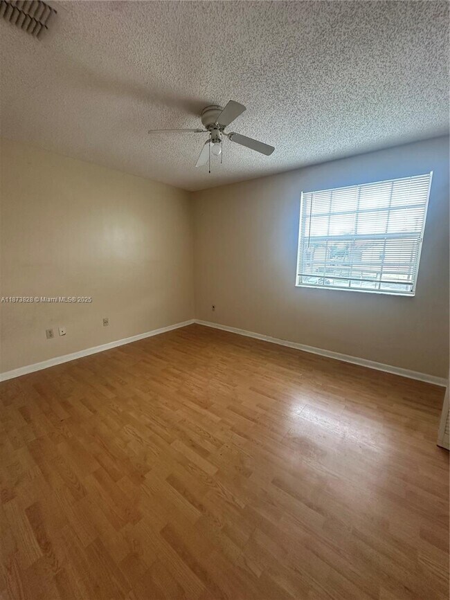 Building Photo - 18318 NW 68th Ave