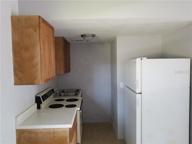 Building Photo - 2700 Palmadelia Ave
