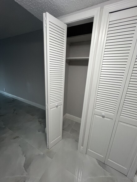 Storage closet in entryway - 1060 NW 80th Ave