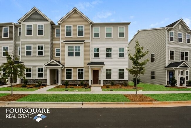 Building Photo - Modern 3-Story Townhome with First-Level Bedroom, Open Floor Plan & Community Pool – Prime RTP Lo...