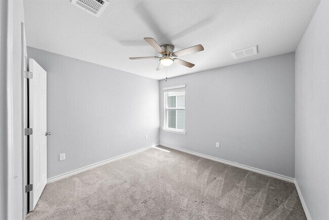 Building Photo - 5002 Plum Peach Bend