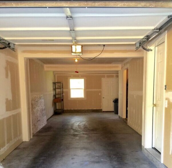 Tandem garage with storage area. - 6123 S 232nd St
