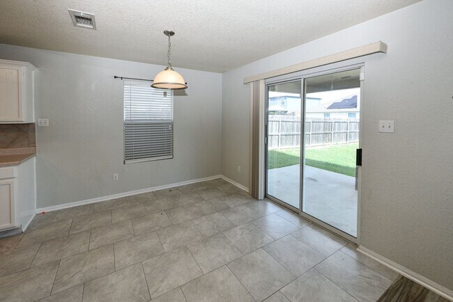 Building Photo - Elegant 4BR/3BA Home with Fireplace, Bonus Room and Open Layout!