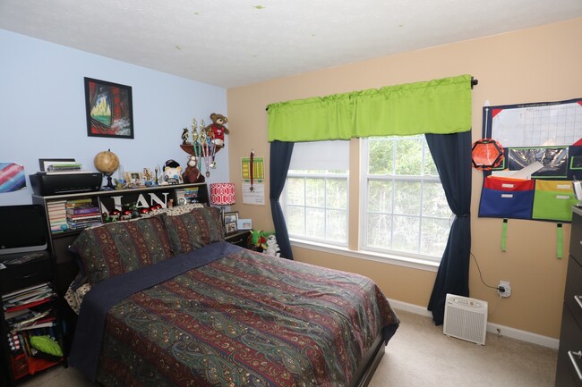 Building Photo - Available -Spacious 2 Car Garaged Townhome...