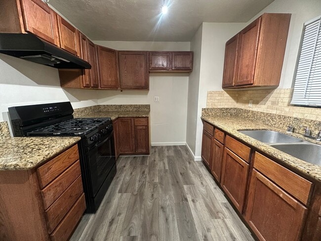 Building Photo - Three Bedroom 2 Bathoom with Large Yard