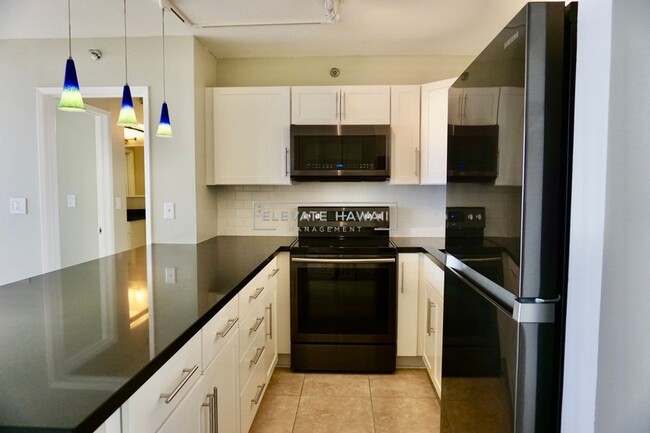Building Photo - OCEAN VIEWS!! Pearl Regency 1 bed 1 bath 2...