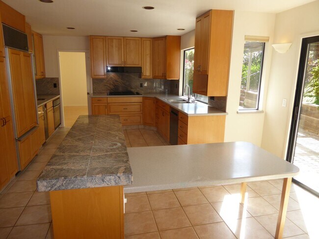 Building Photo - SPACIOUS FOUR BEDROOM / THREE AND HALF BAT...