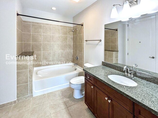 Building Photo - Modern Downtown Richmond 1BR Condo with In...