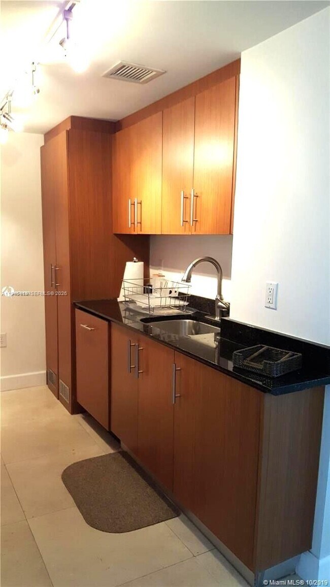 Building Photo - 10275 Collins Ave