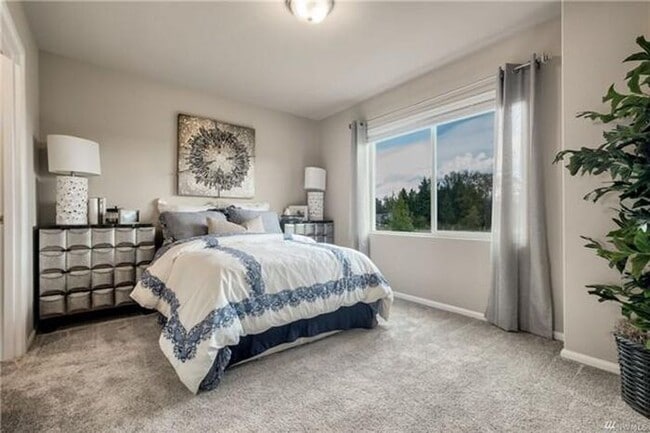 Building Photo - Sunrise TOWN HOME 2BDR 2.5BATH W/ 2 CAR GA...